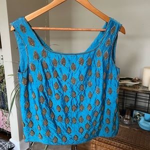 Blue vintage tank with silver beading.